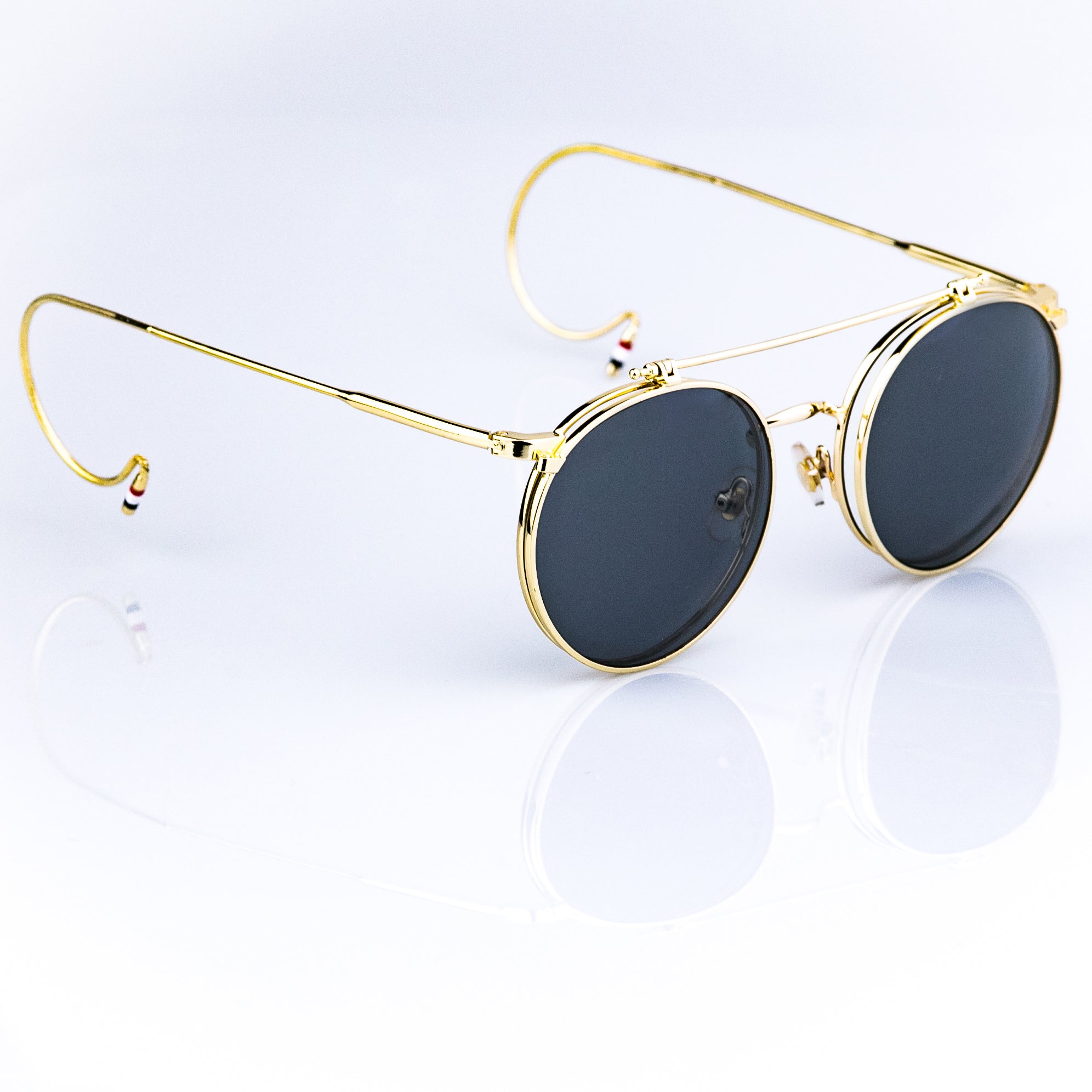 Round black sunglasses outlet gold frame
